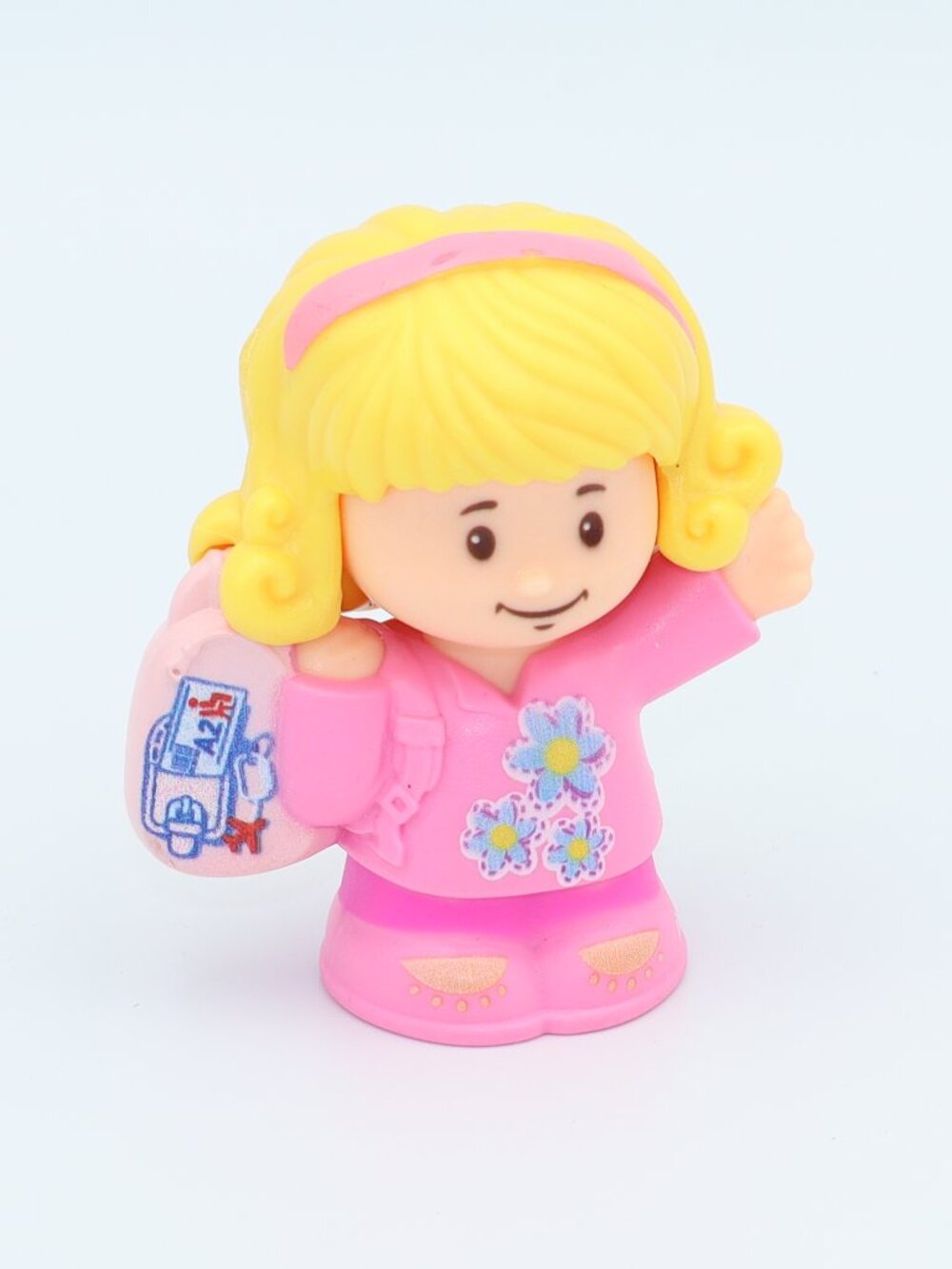 Fisher-Price Little People figure of Emma with her pink backpack from the 2016